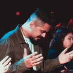 Group Prayer by Ismael Paramo