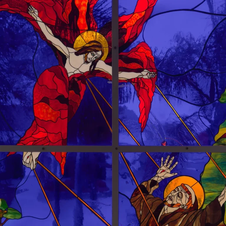 St. Francis receives the stigmata, wounds of Christ.